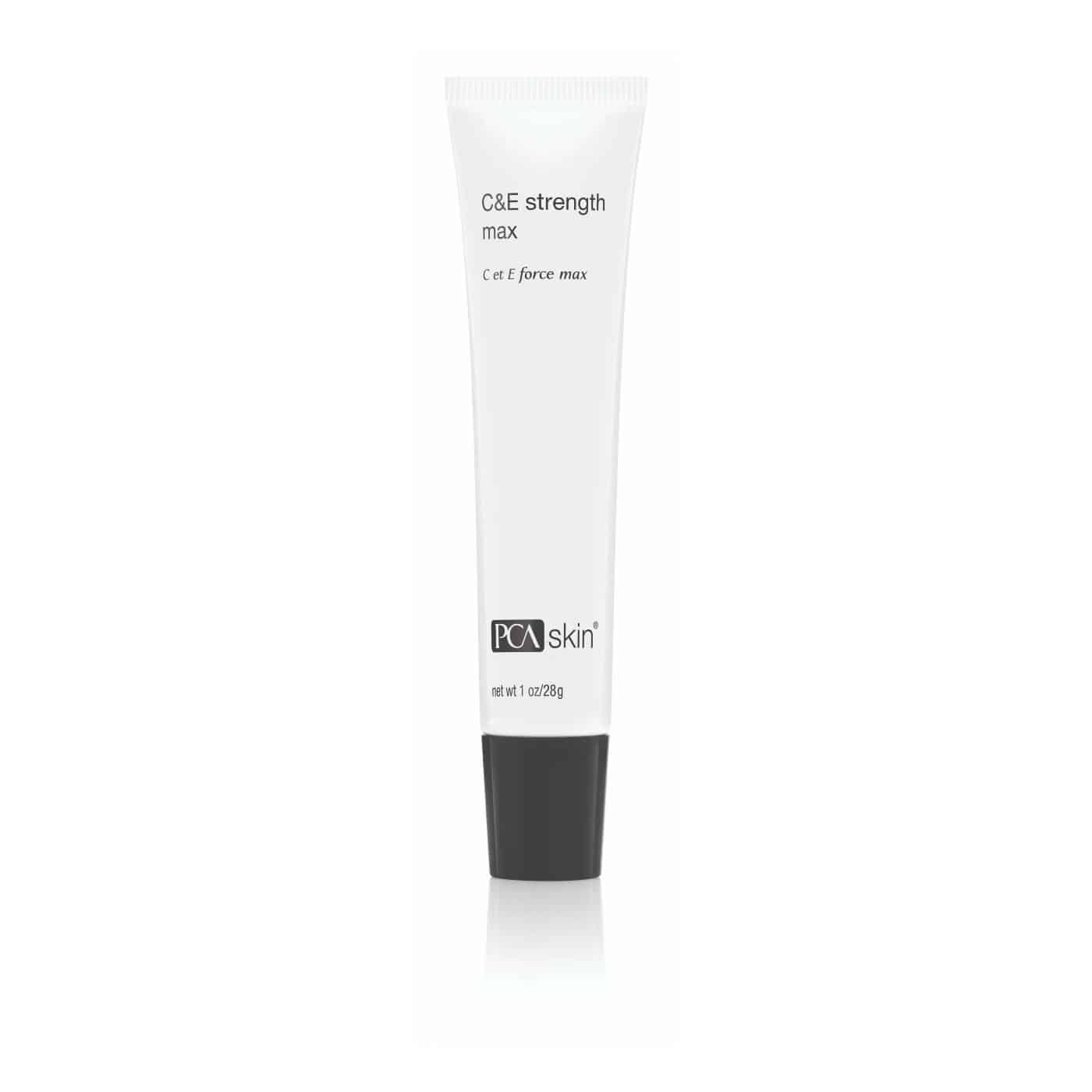 A white tube of C&E Strength Max 28g with a black cap, rich in vitamin C for skin brightening, stands upright against a white background.