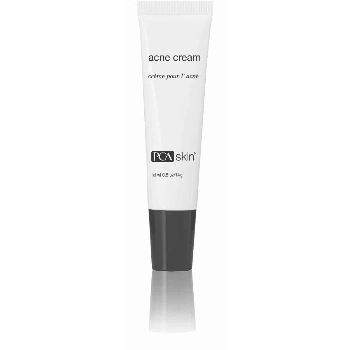 A white tube of Acne Cream with a black cap. The label displays "acne cream" and "crème pour l&