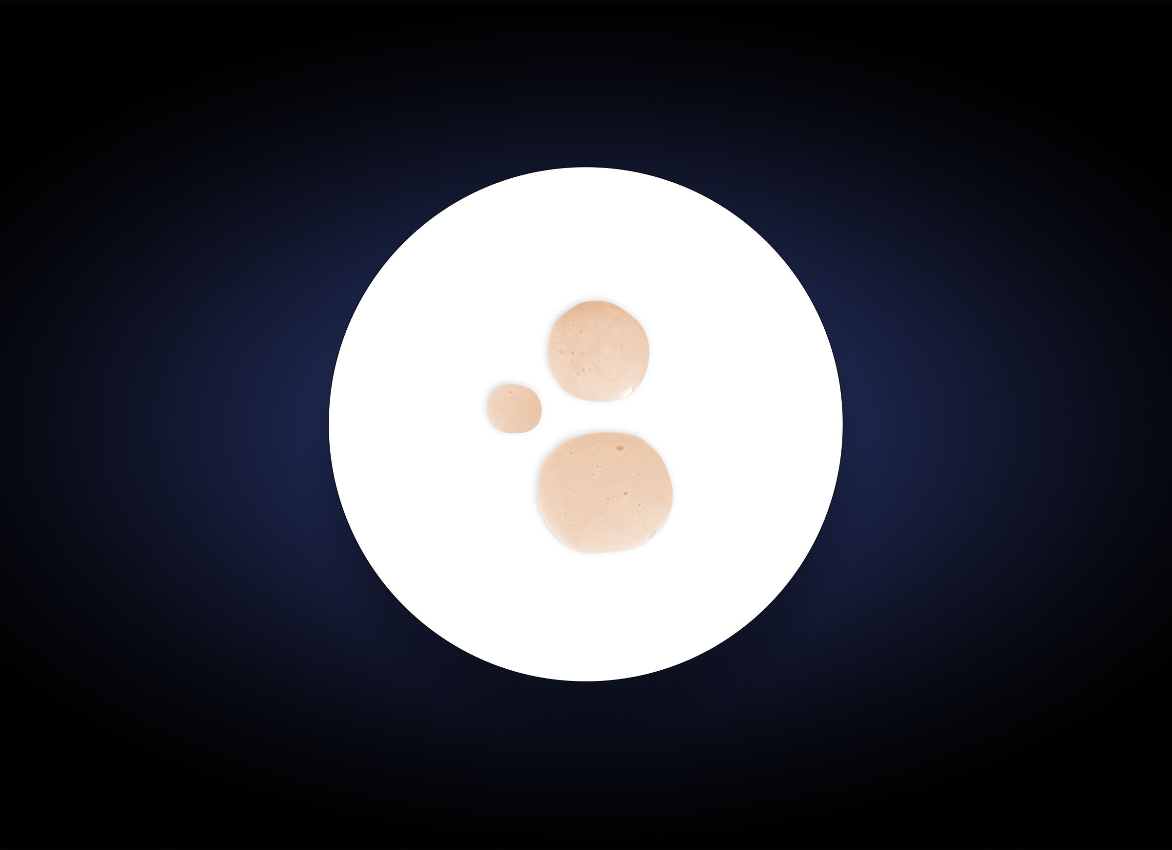 A white plate holds three round, beige drops arranged triangularly on a dark blue-black gradient background—evoking the smooth, dewy finish of Hydrating Toner Spray 30 ml.