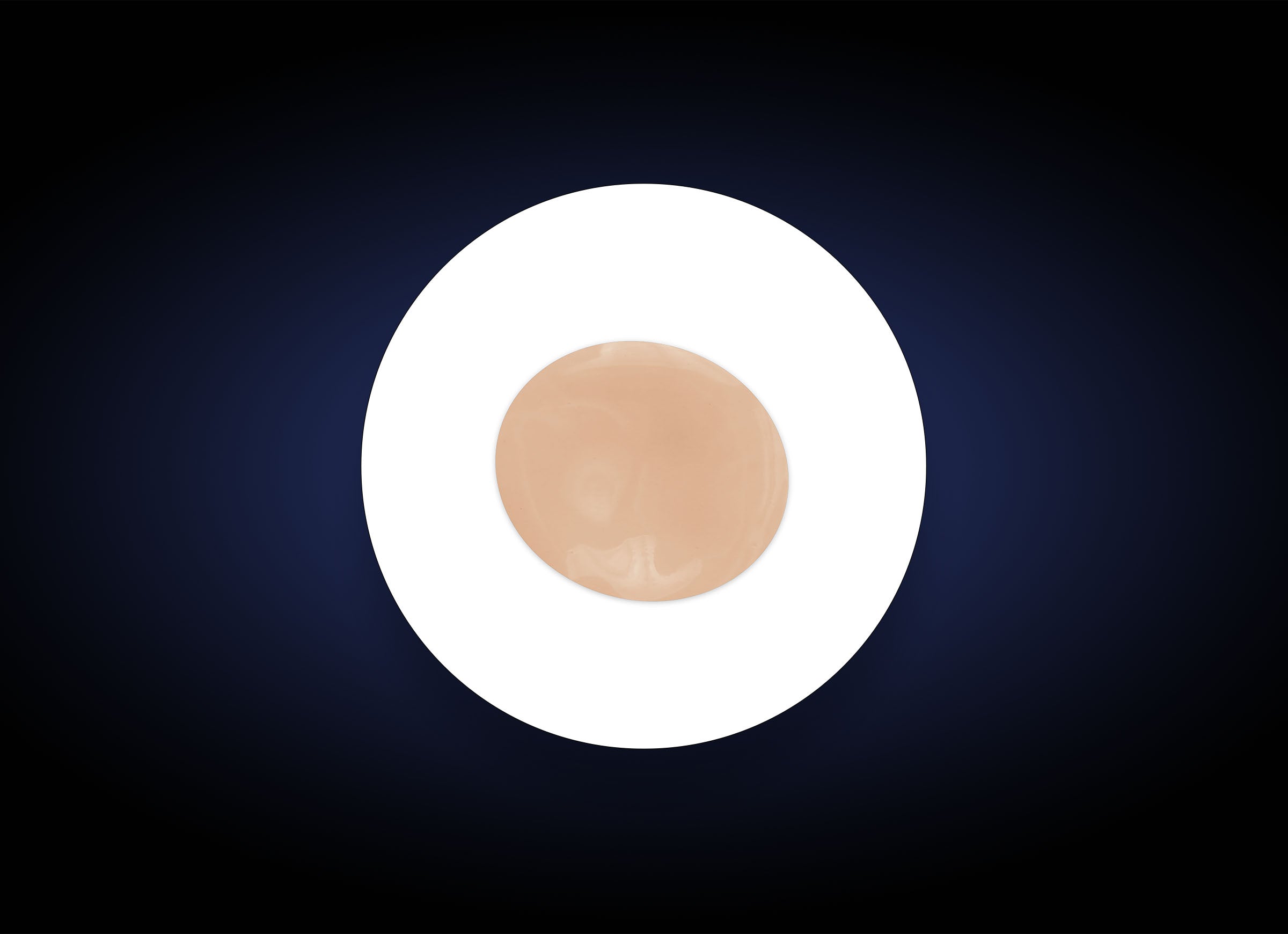 A round, white plate with a single C&E Advanced disc in the center, placed against a dark blue gradient background. The disc is smooth and shiny, resembling a flat, thin object infused with an antioxidant formula.