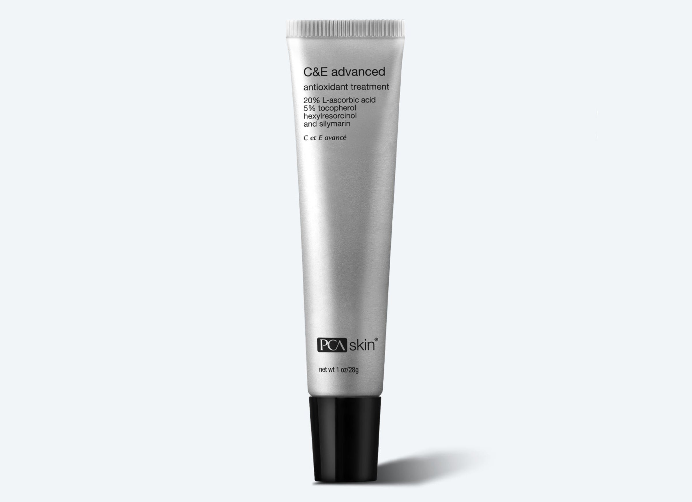 A silver tube of C&E Advanced against a light gray background. This potent antioxidant serum features black text detailing its ingredients, including 20% L-ascorbic acid, 5% tocopherol, hexylresorcinol, and silymarin. Perfect for reducing dark spots and signs of ageing.
