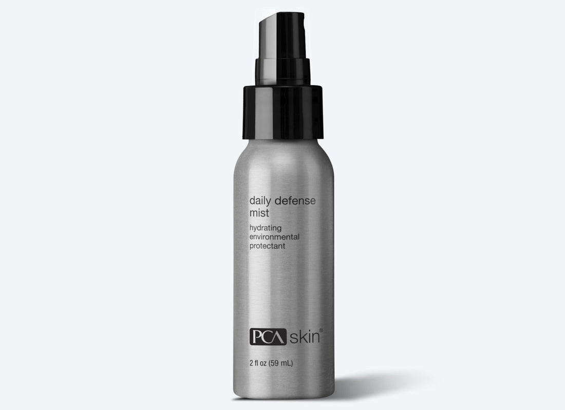 The Daily Defense Mist Antioxidant Spray (59 ml) from PCA Skin is a silver spray bottle with a black pump top, delivering instant hydration and blue light protection.