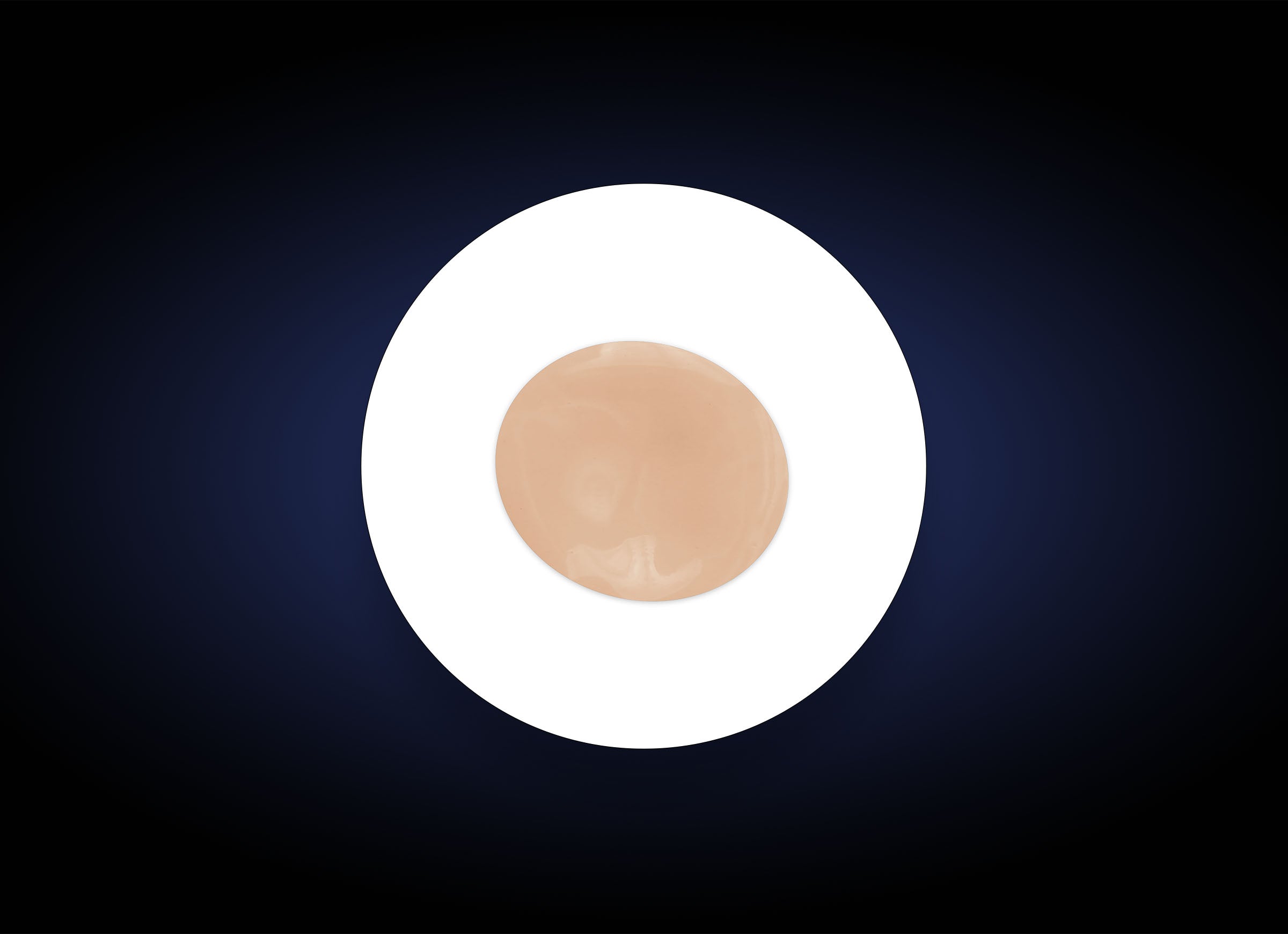 A round, white plate with a single C&amp;E Advanced disc in the center, placed against a dark blue gradient background. The disc is smooth and shiny, resembling a flat, thin object infused with an antioxidant formula.