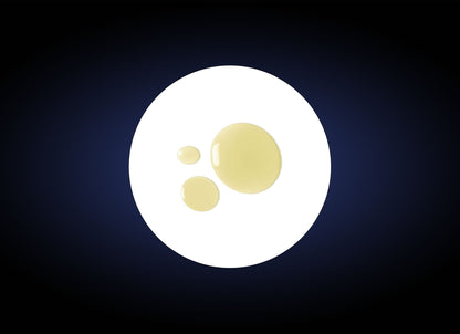 An image showcasing three drops of a yellowish liquid, reminiscent of a high-quality Facial Wash for normal and sensitive skin, on a white circular background. Set against a dark blue to black gradient backdrop, the drops vary in size with the largest at the bottom and smallest at the top.