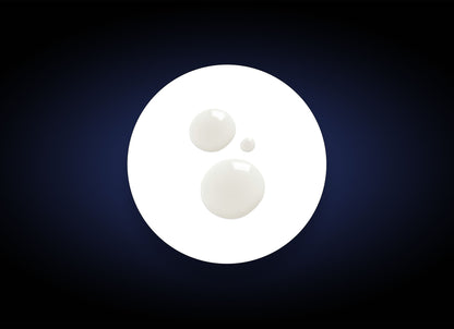 A white circle featuring three smaller white droplets of varying sizes on its surface, positioned against a dark gradient background. The droplets, resembling biodegradable exfoliants in Daily Exfoliant, are placed somewhat asymmetrically within the circle.