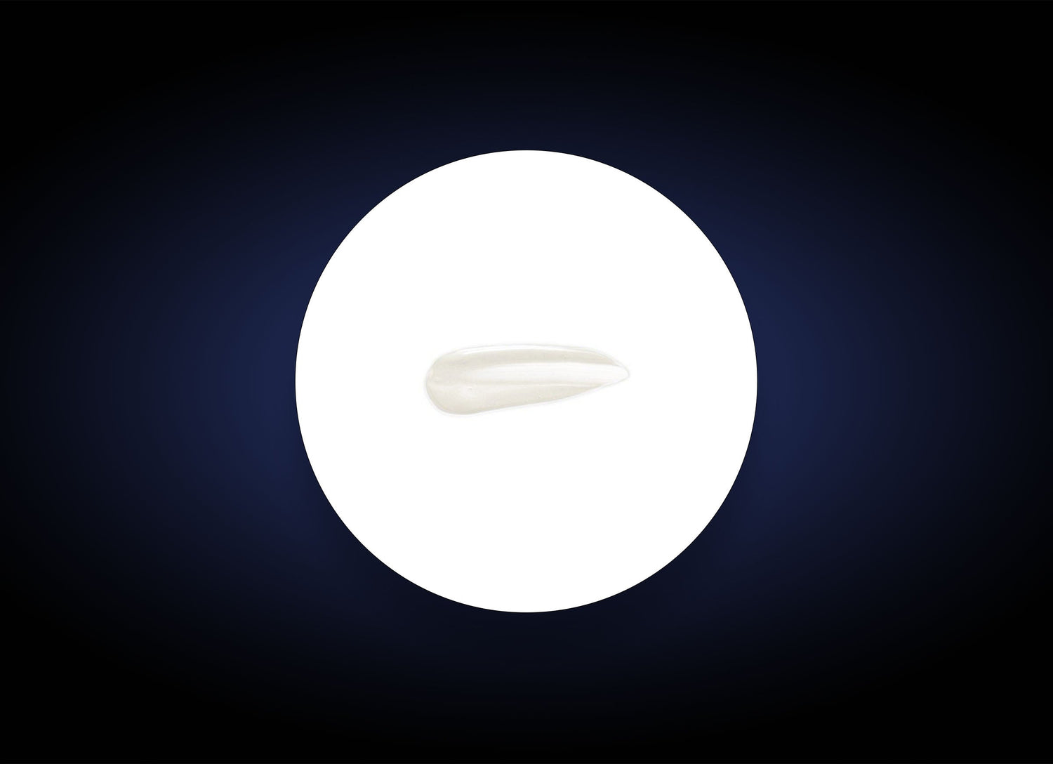 A single, smooth white tooth isolated on a circular white background, surrounded by a dark gradient border. The tooth is centered, and its elongated shape is clearly visible against the contrasting backdrop, much like an HA Lip Overnight Mask rejuvenates and plumps your lips overnight.