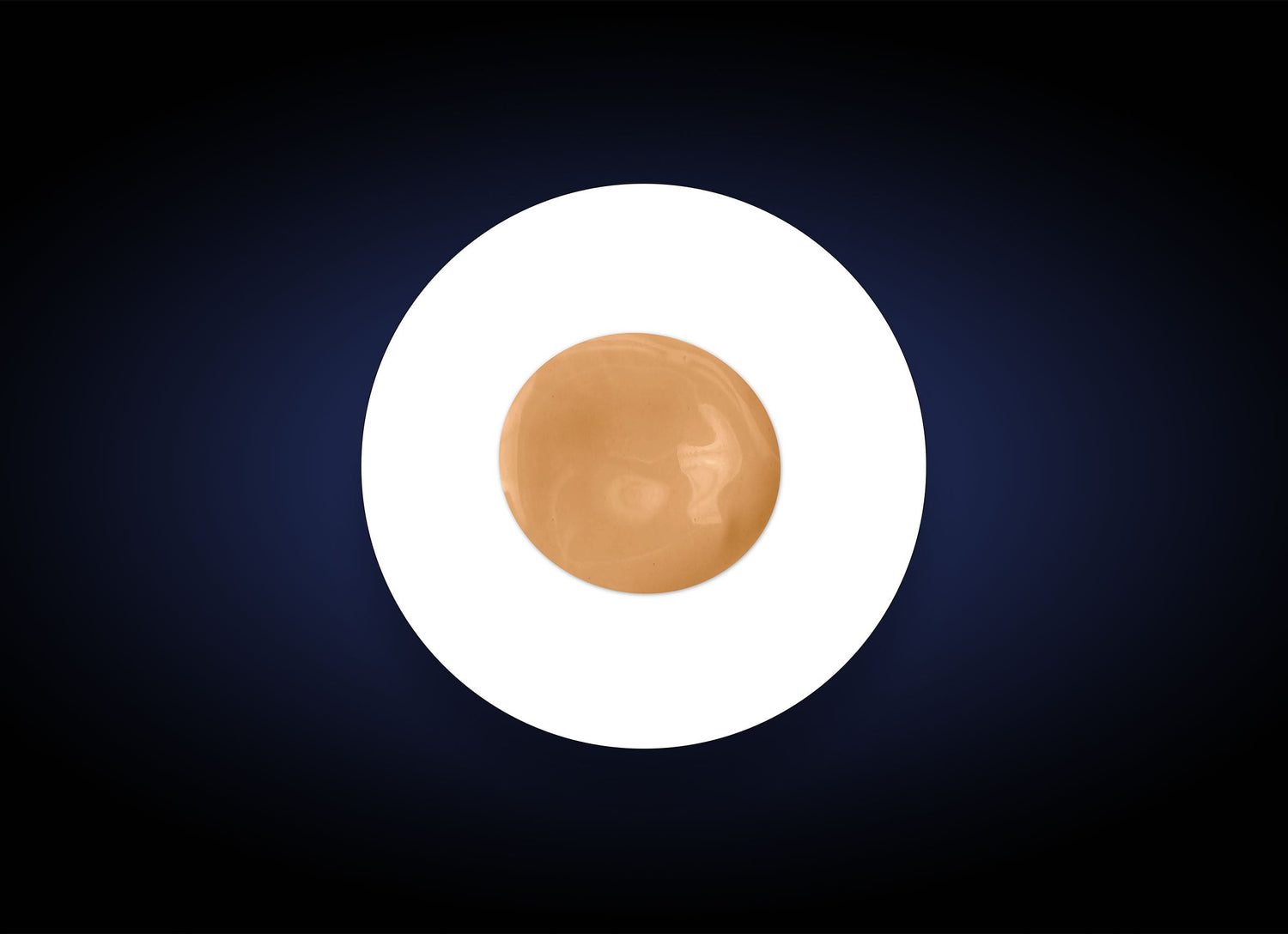 A round, beige spot is centered on a white circular background, set against a dark blue to black gradient backdrop. The smooth, shiny spot resembles the finish of Sheer Tint Broad Spectrum SPF 45, contrasting starkly with the white circle and dark background.