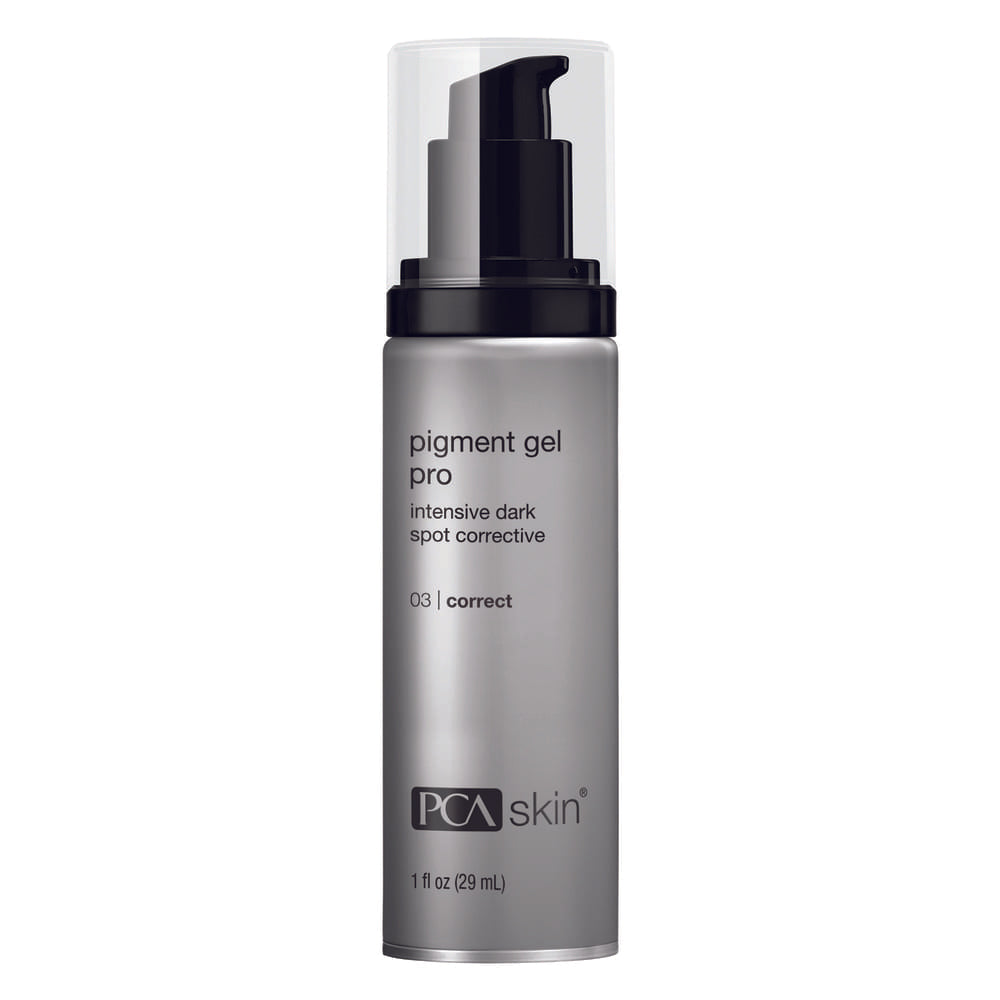 A silver cylindrical bottle of Pigment Gel Pro, an intensive dark spot corrective treatment featuring the SynerPro Complex for advanced discoloration reduction. The bottle has a black pump dispenser and a clear plastic cap. The text on the bottle indicates it is 1 fl oz (29 mL) and used for correcting dark spots.