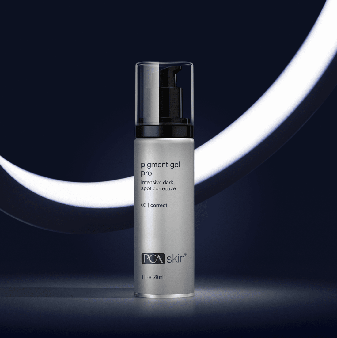 A sleek silver bottle of Pigment Gel Pro 29ml, an intensive hydroquinone-free dark spot corrector for discoloration, stands on a dark surface with a curved white light in the background, featuring a black pump.