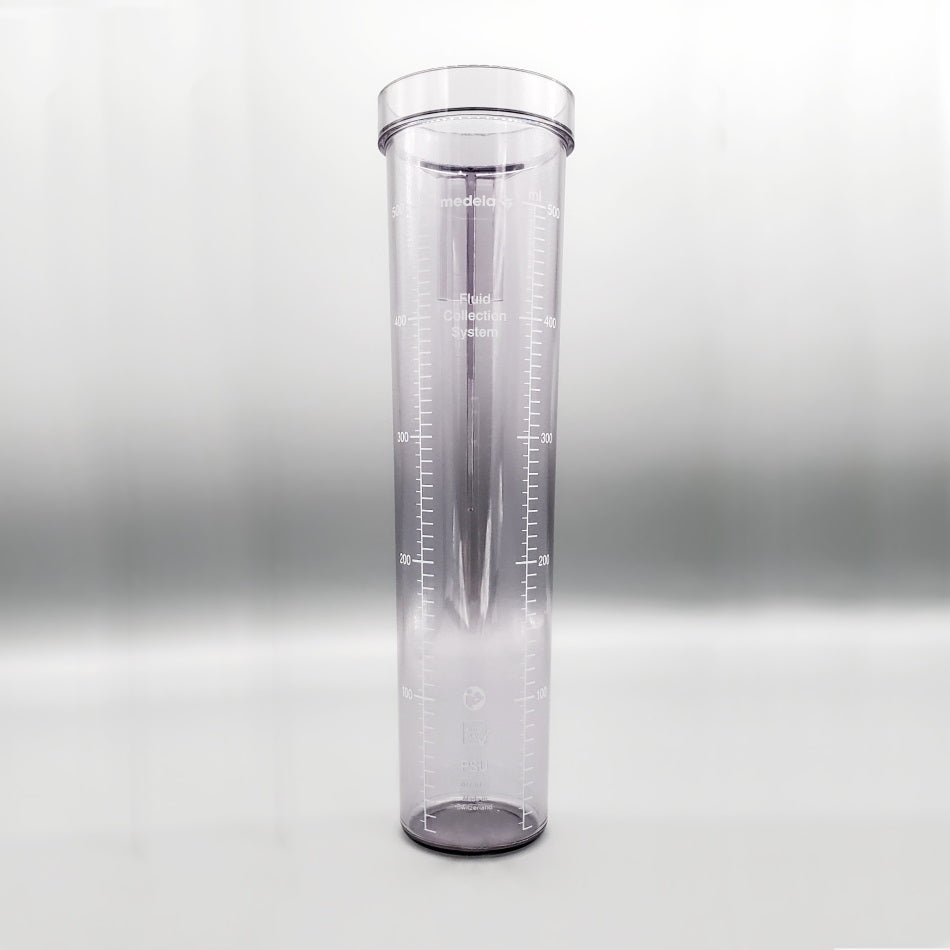 A transparent, cylindrical measuring container with graduated markings ranging from 50 ml to 500 ml, used for precise liquid measurements, against a plain white background. The 500CC Reusable Canister - No Port/No Lid has a wide opening at the top and narrows slightly towards the bottom.