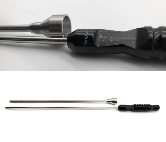 An image showing a Markmann Drain Inserter with a sharp, elongated metal shaft and a black handle labeled &quot;Black &amp; Black VITRUVIAN.&quot; The autoclavable reusable system is depicted from two angles: a close-up of the handle and a full view displaying its entire length and tip.