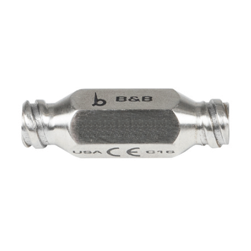 A small, silver metallic Syringe To Syringe Luer Lock Connection with a cylindrical shape. The product has the text &quot;B&amp;B&quot; and &quot;USA CE 018&quot; engraved on its body, along with a logo. The ends are tapered for connecting to a hose or pipe.