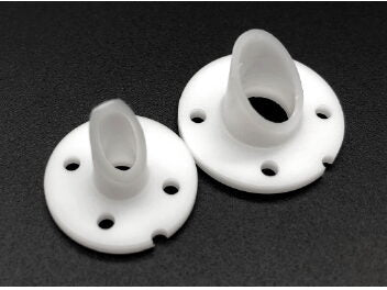 Two white plastic components lay on a dark surface. Each has a cylindrical protrusion and a circular base with evenly spaced holes, reminiscent of LipoPort™ used in liposuction procedures. The base of each component has a small notch.