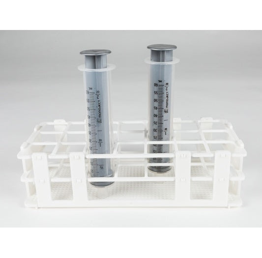 A Syringe Rack 60CC Autoclavable with two large, transparent measuring cylinders placed upright inside it. The cylinders are marked with measurement lines and contain some liquid, each with a grey cap on the top. The background is plain and white.