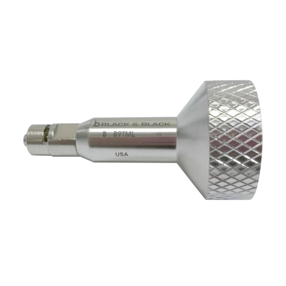 A silver Toomey 60cc to Luer Lock Cannula Connector, Stainless Steel dental instrument, featuring a knurled grip area and an inscription reading &quot;B-891ML USA&quot; on the body, designed for precision dental procedures.