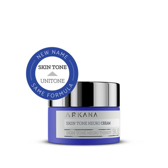 A blue jar of Skin Tone Neuro Cream 50ml with a silver lid. A round label says "New Name: Skin Tone = Unitone, Same Formula," and the product name appears clearly on the front.