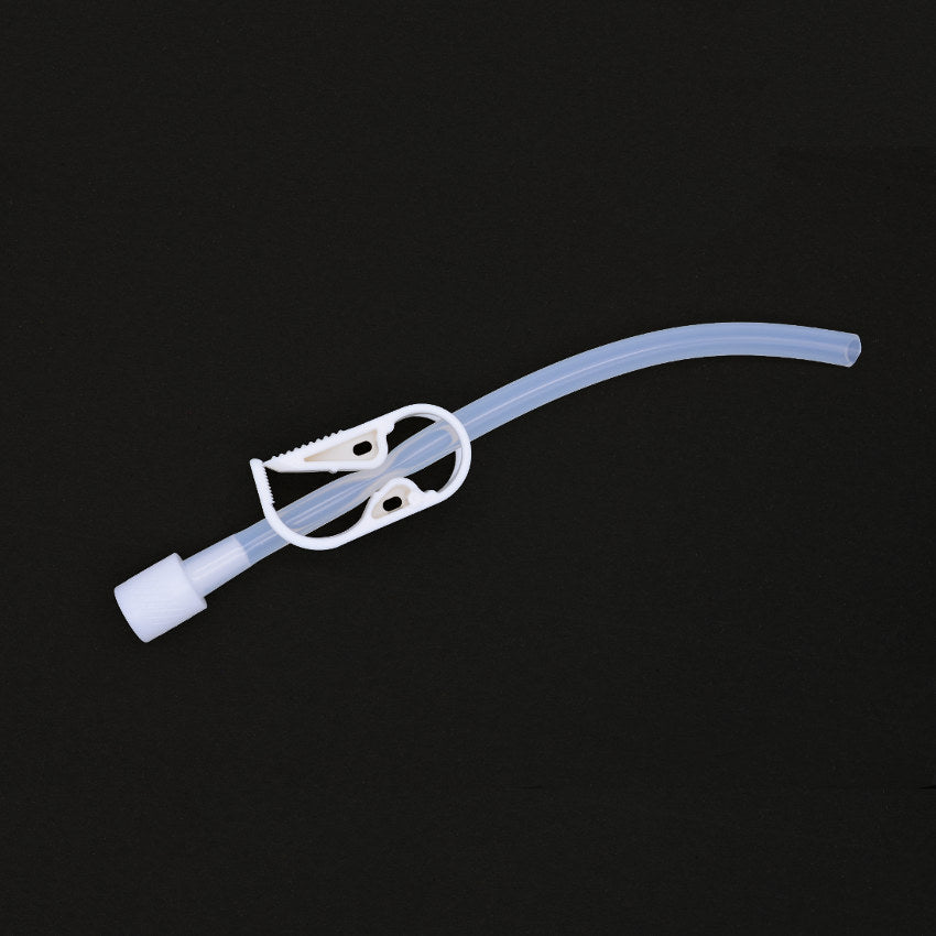 A Silicone Transfer Tube With C-Clamp And Toomey Connector For Tapered Fitting with a white C-clamp attached to it. The clamp has serrated edges and is secured around the midsection of the tube, which is slightly bent at one end. The background is solid black.