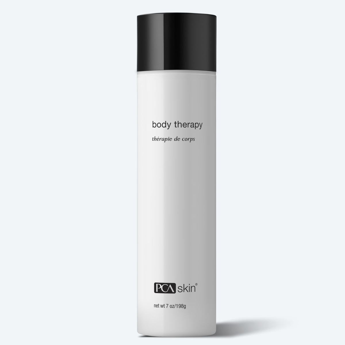 A tall, cylindrical, white bottle with a black cap is labeled &quot;Body Therapy&quot; and &quot;PCA Skin&quot; in minimalist black text. Promising smooth skin texture through advanced ingredients, this therapeutic body moisturizer has a net weight of 7 oz/198g. The bottle stands against a light gray background.