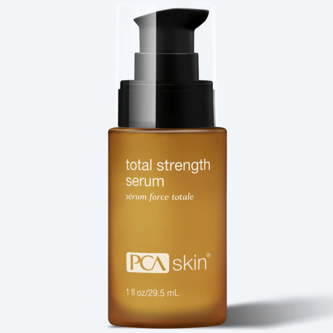 A 1 fl oz / 29.5 mL brown bottle of PCA Skin Total Strength Serum features a black pump and a clear cap. The label displays the words &quot;total strength serum&quot; and &quot;sérum force totale.&quot; This anti-aging serum is designed to firm the skin and minimize pores, promoting a more youthful appearance.